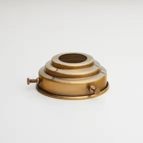 Stepped gallery in antiqued brass